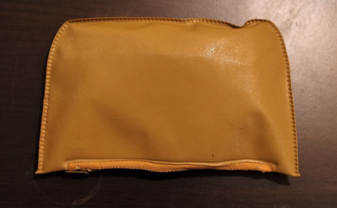 old leathery change purse