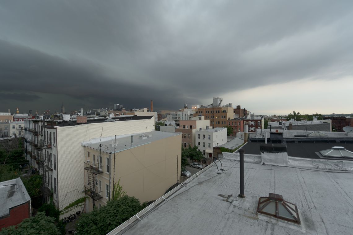 storm clouds over manhattan and brooklyn williamsburg bad weather
