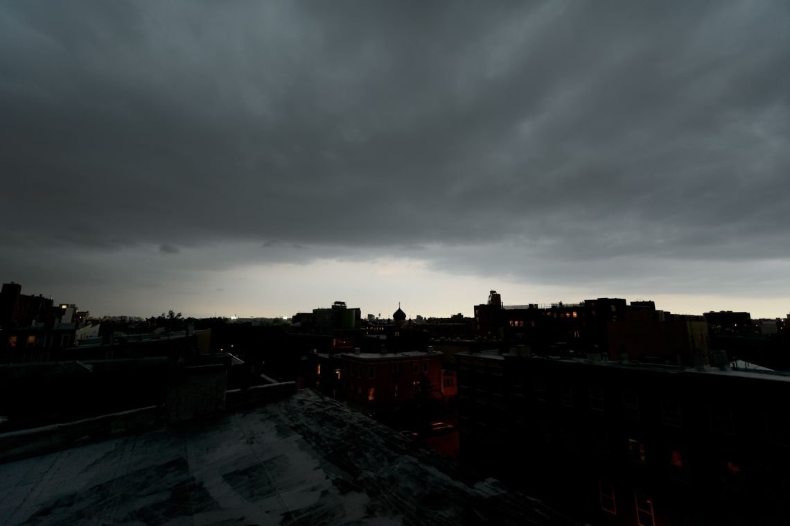 storm clouds over manhattan and brooklyn williamsburg bad weather