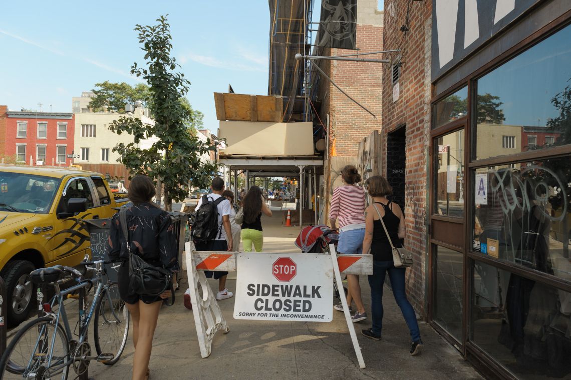 ignoring sign sidewalk closed brooklyn people