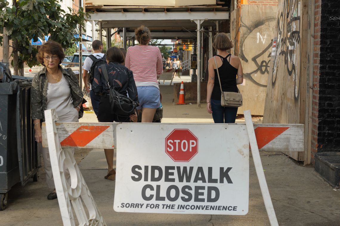 ignoring sign sidewalk closed brooklyn people
