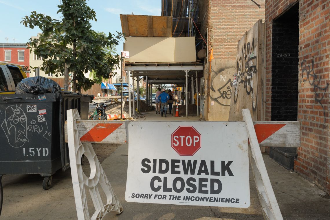 ignoring sign sidewalk closed brooklyn people