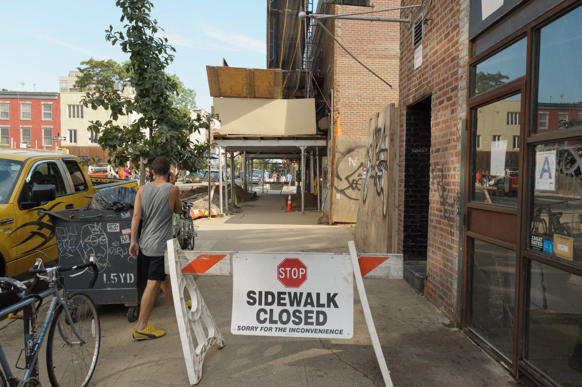 ignoring sign sidewalk closed brooklyn people