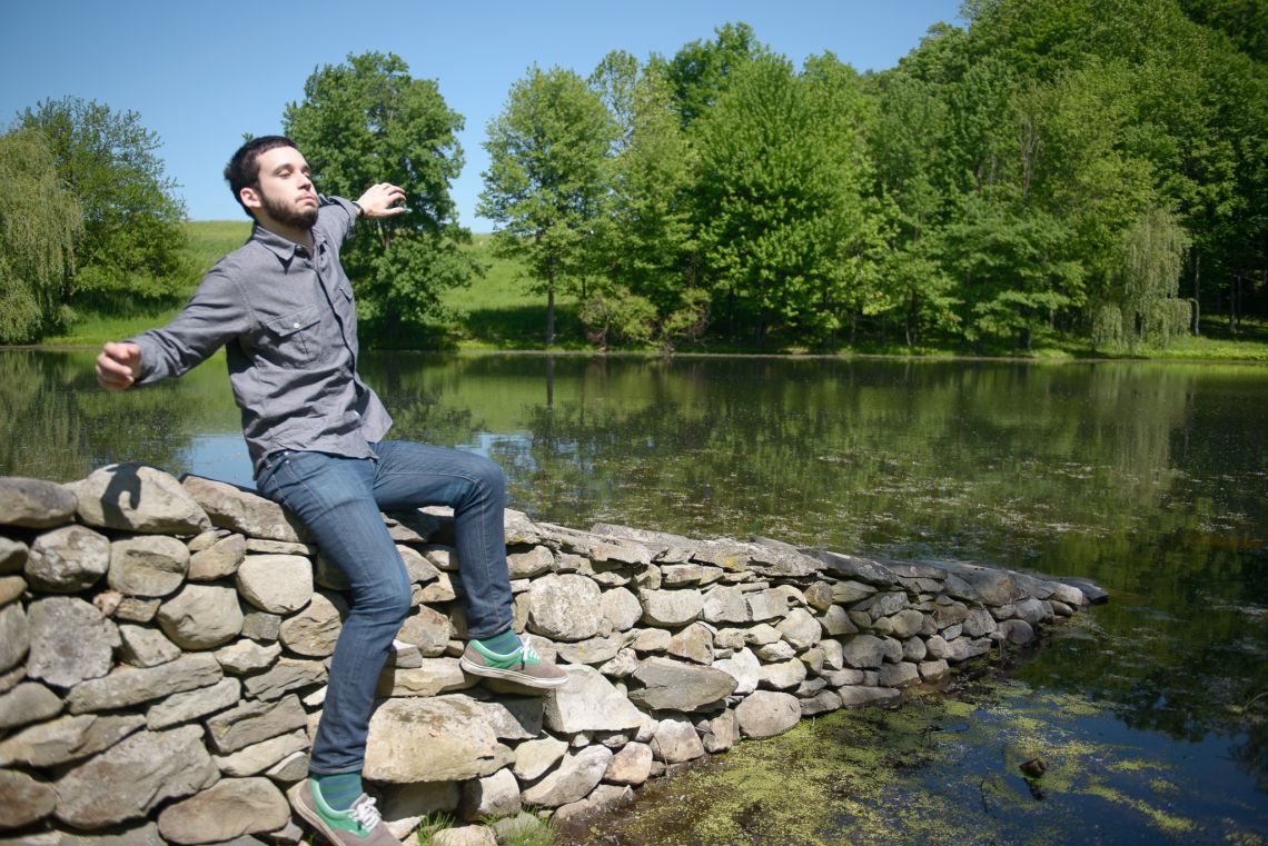 falling off stone wall