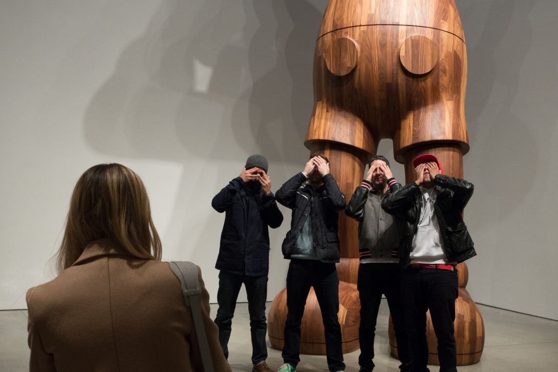 Posing in front of KAWS at Mary Boone