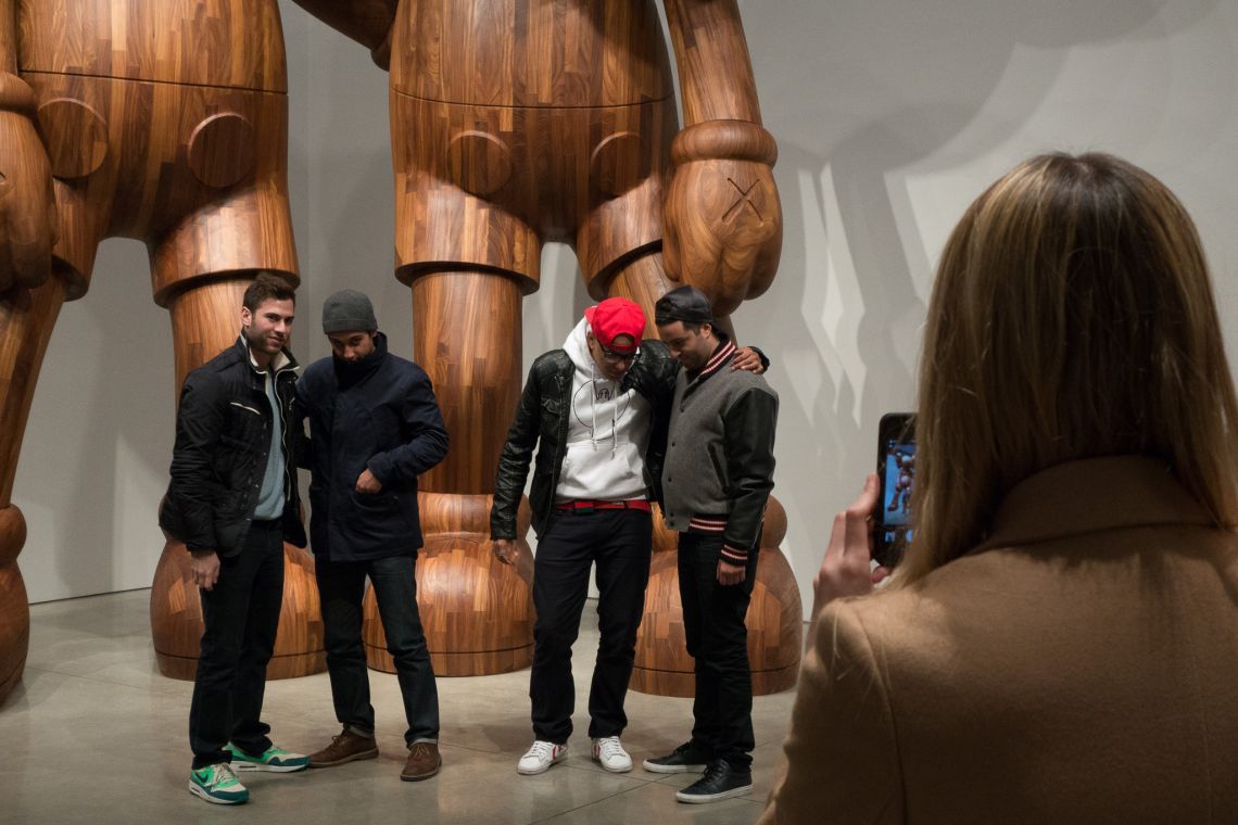 Posing in front of KAWS at Mary Boone
