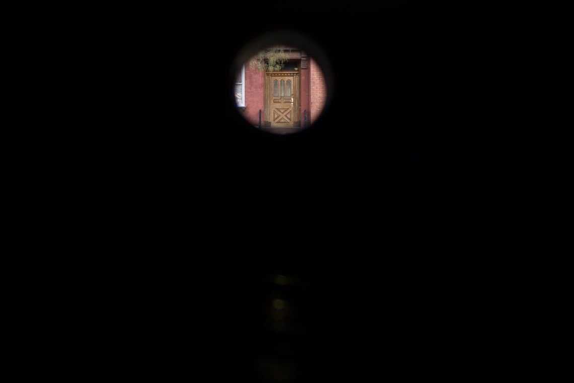 The hole in the door, exposed for the light outside
