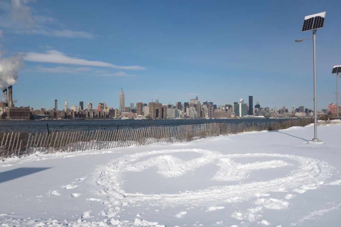 Somebody etched &quot;Heart NYC&quot; in the snow near the shore