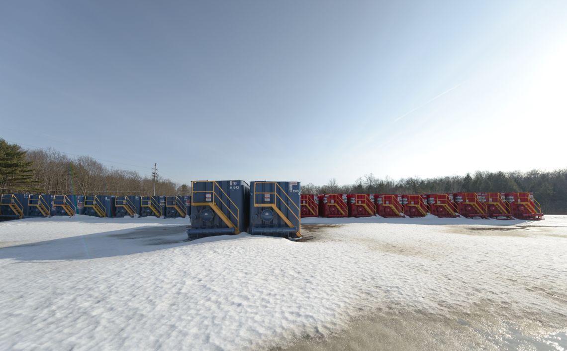 field of red and blue containers