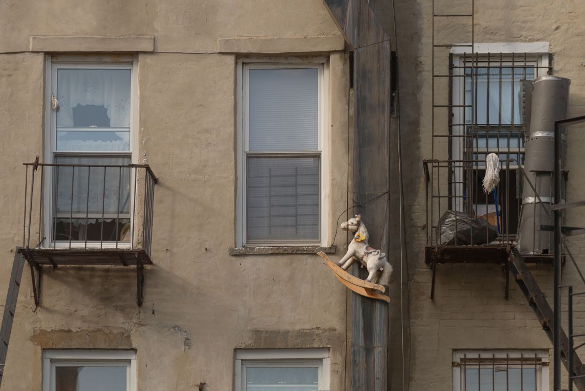 rocking horse in window bed stuy