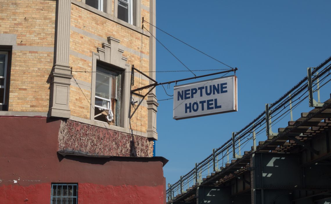 sign for the neptune hotel