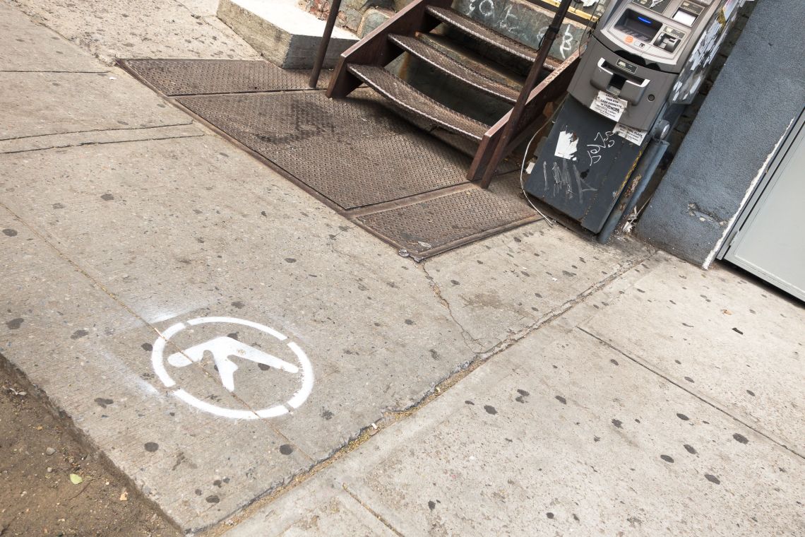 Aphex Twin logo spray painted williamsburg sidewalk