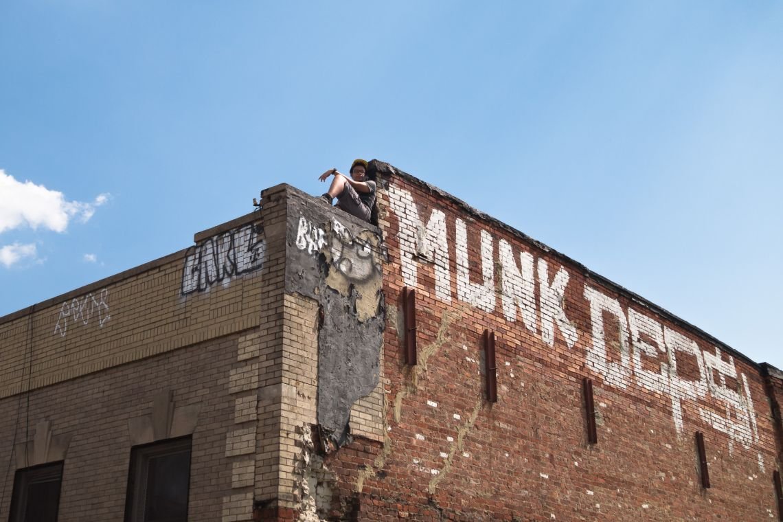young man rooftop bed-stuy