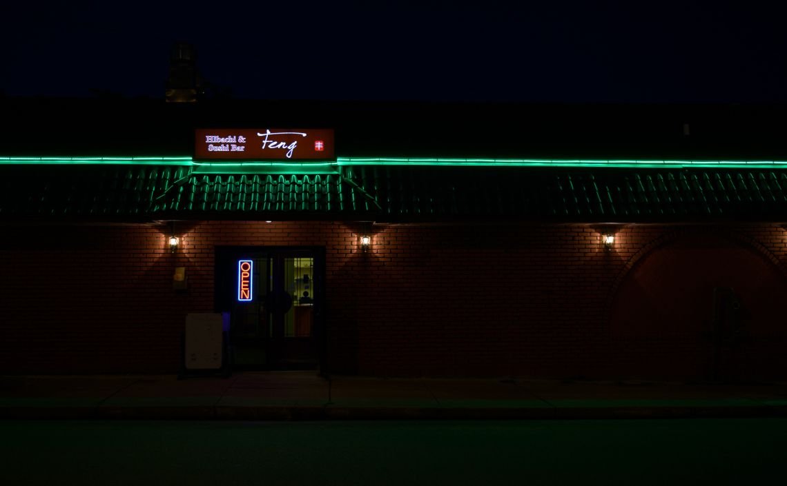 Restaurant roof LEDs in Green at night