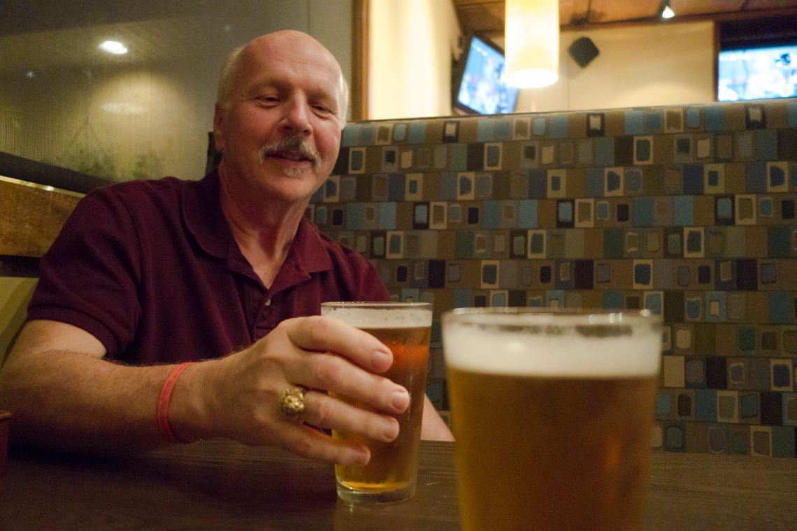 dad reaching for beer