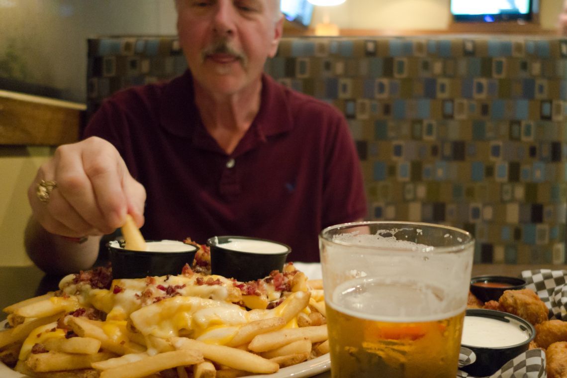 dad reaching for fries