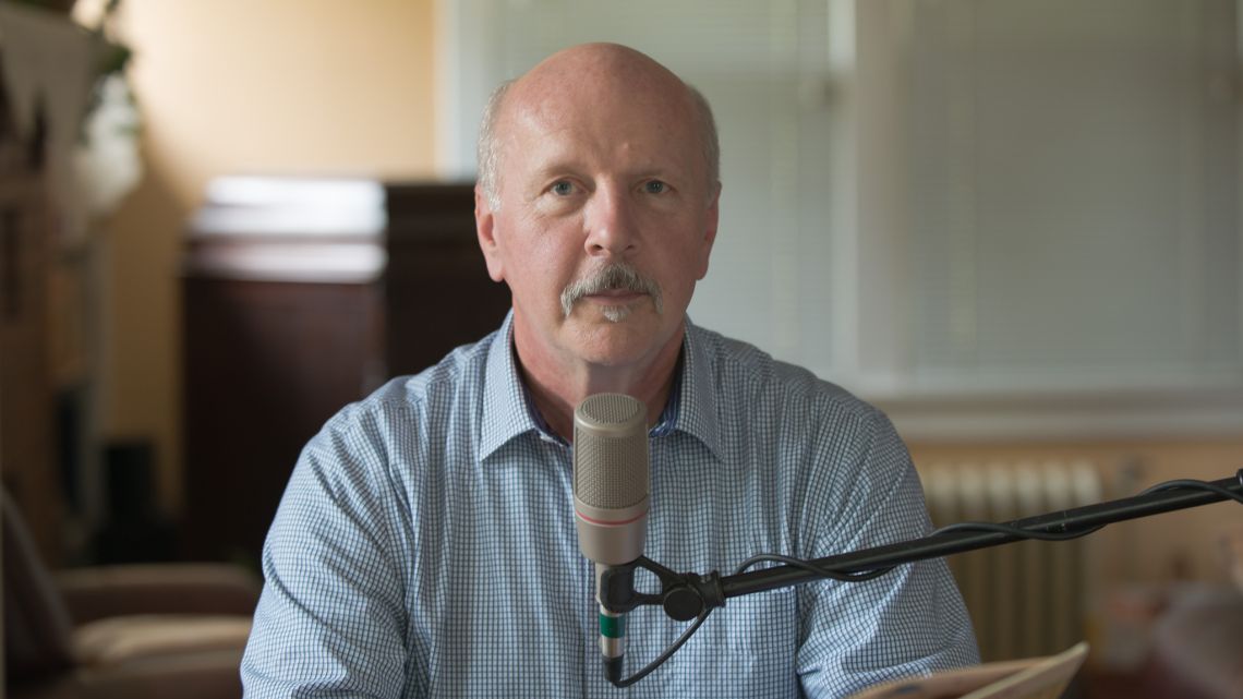 man prepares to make audio recording