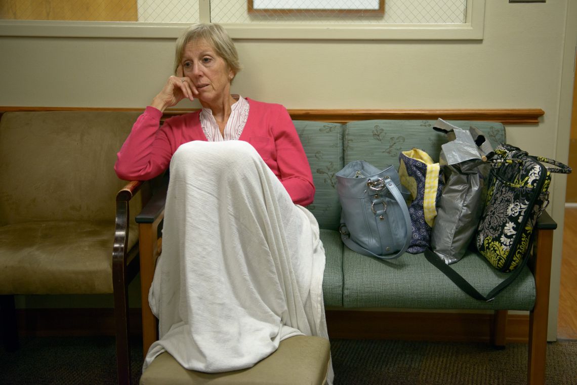 mother on couch hospital waiting room