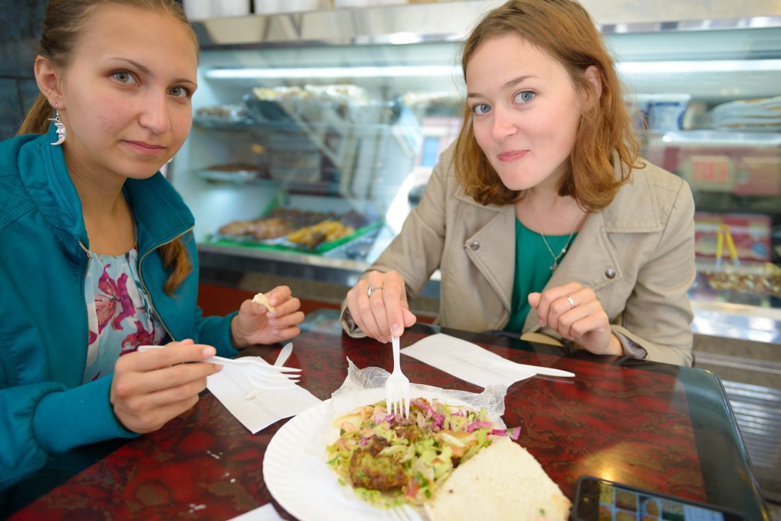 russian girls about to eat falafel