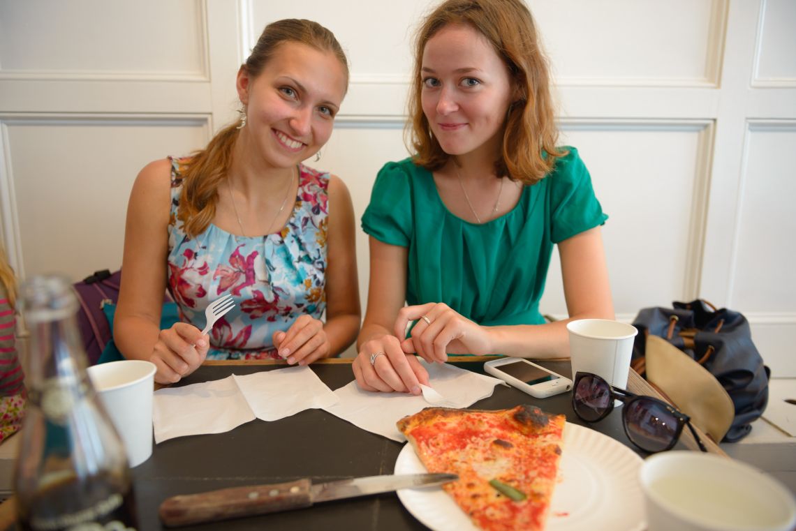 russian girls about to eat pizza