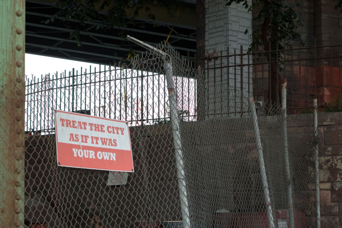 sign under bqe treat city as your own