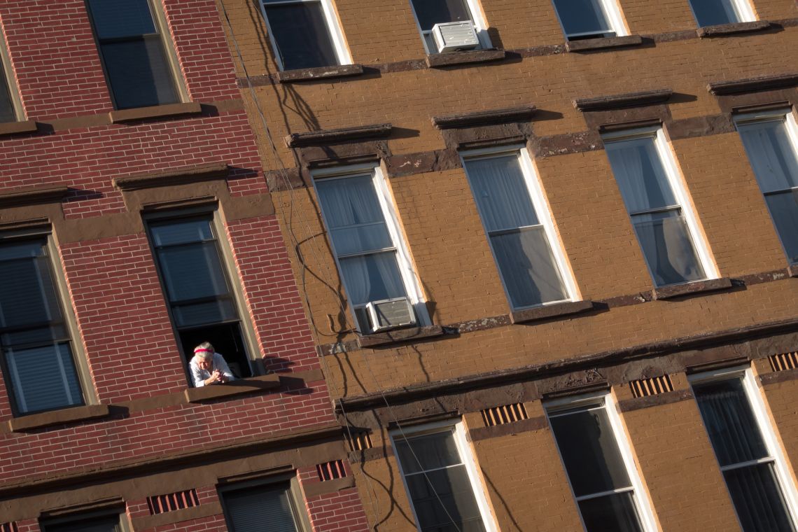 woman watching greenpoint avenue brooklyn
