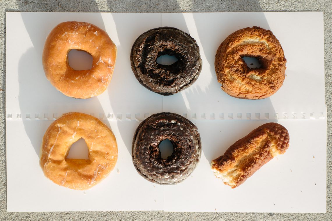 Sugar donuts, chocolate cake donuts, old fashioned donut and cruller
