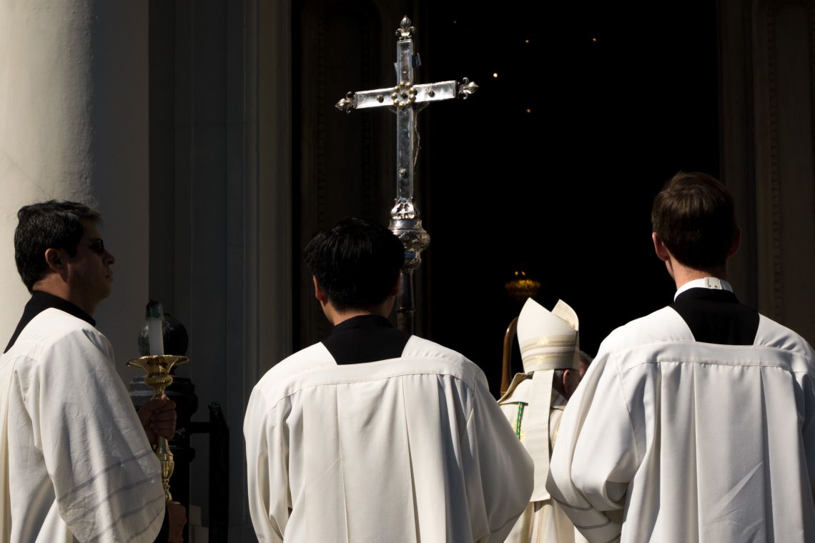 bishop and attendants outside st louis cathedral