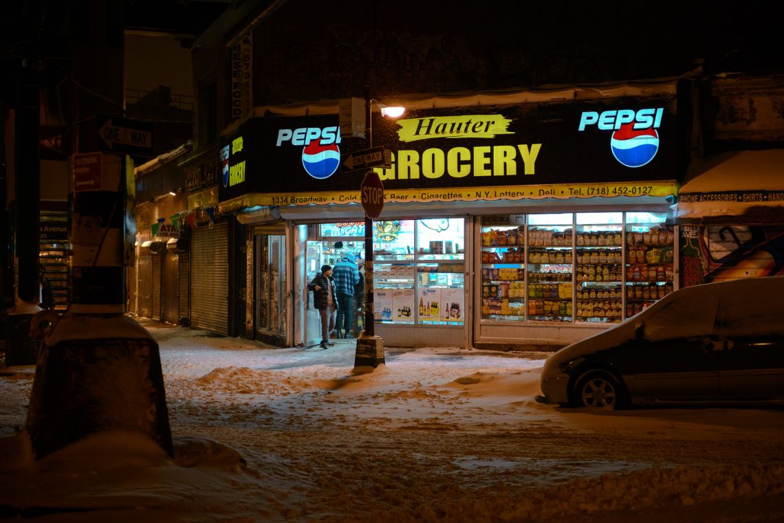 Corner stores and their customers still carry on with business as usual.