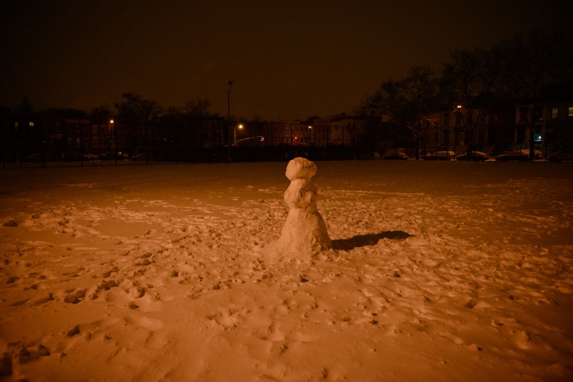 lumpy snowman stands in the Reinaldo Salgado Playground