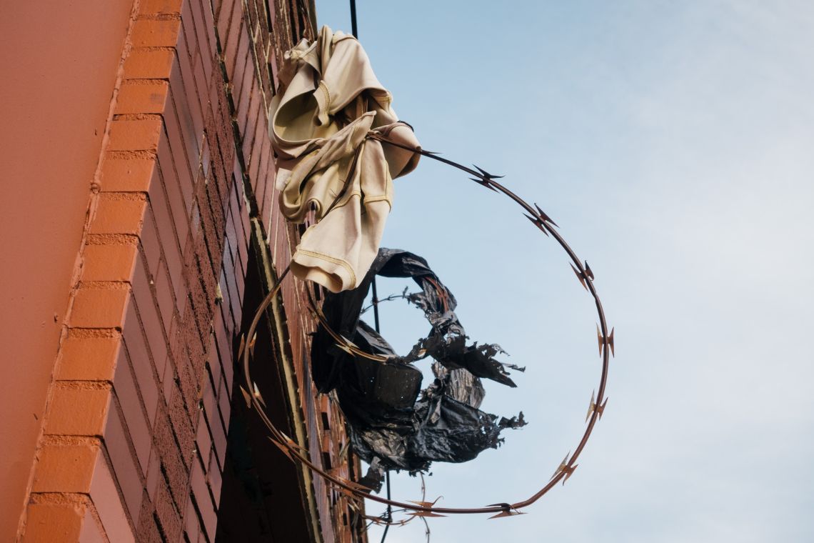Polo shirt on barbed wire