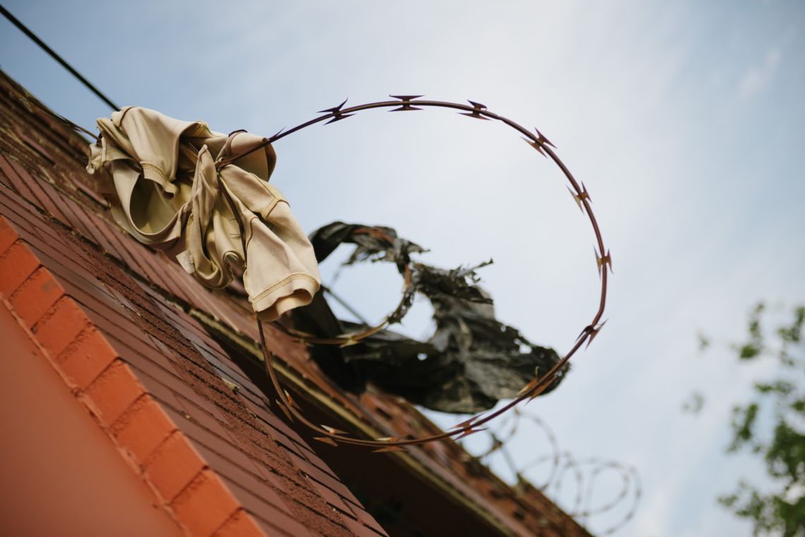 Polo shirt on barbed wire