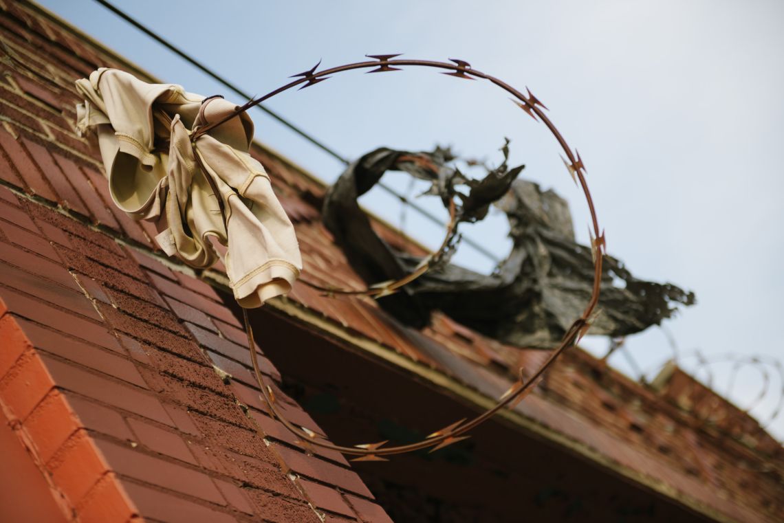 Polo shirt on barbed wire