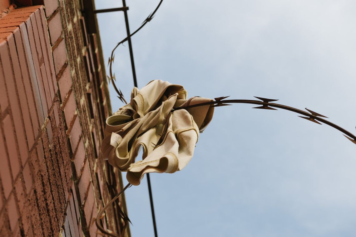 Polo shirt on barbed wire