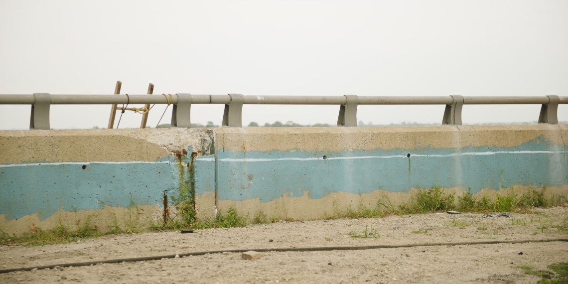 A ladder against a barrier along Beach Channel Drive