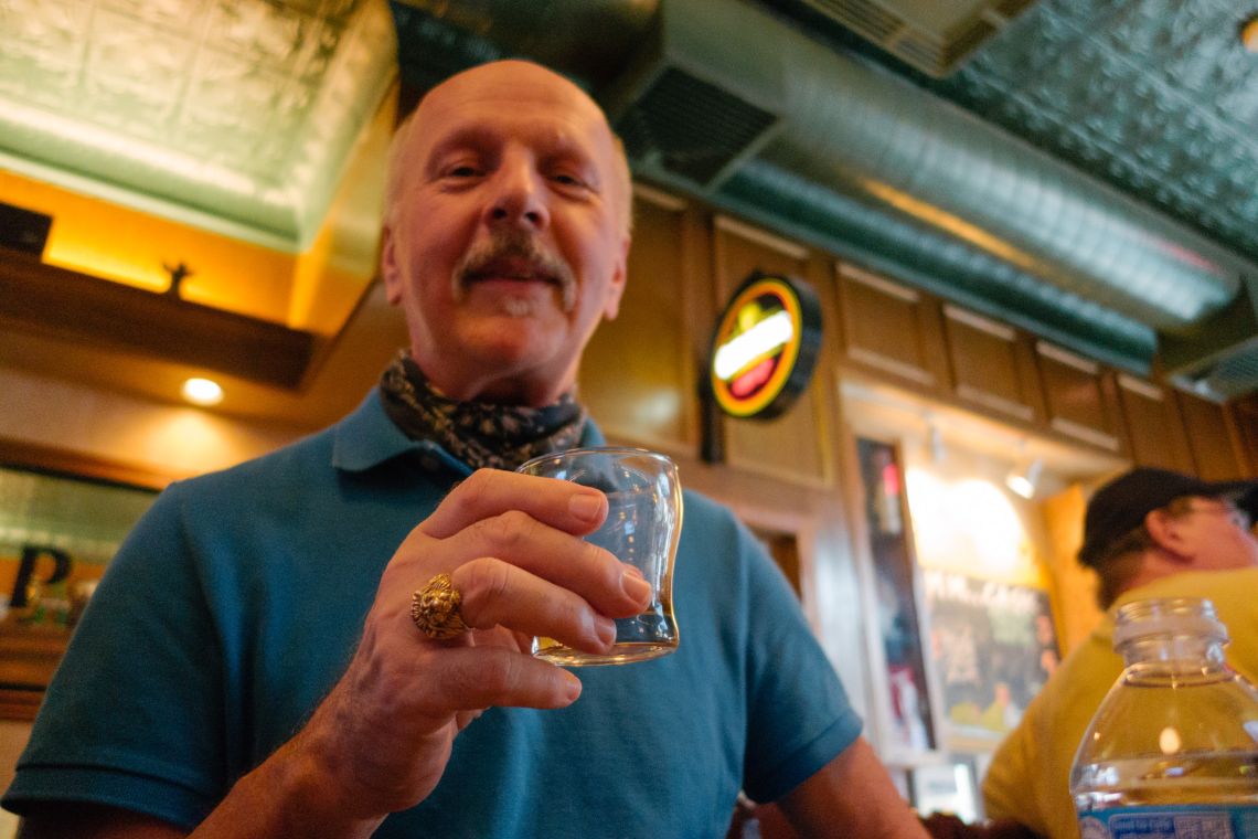 Pa hoists a glass