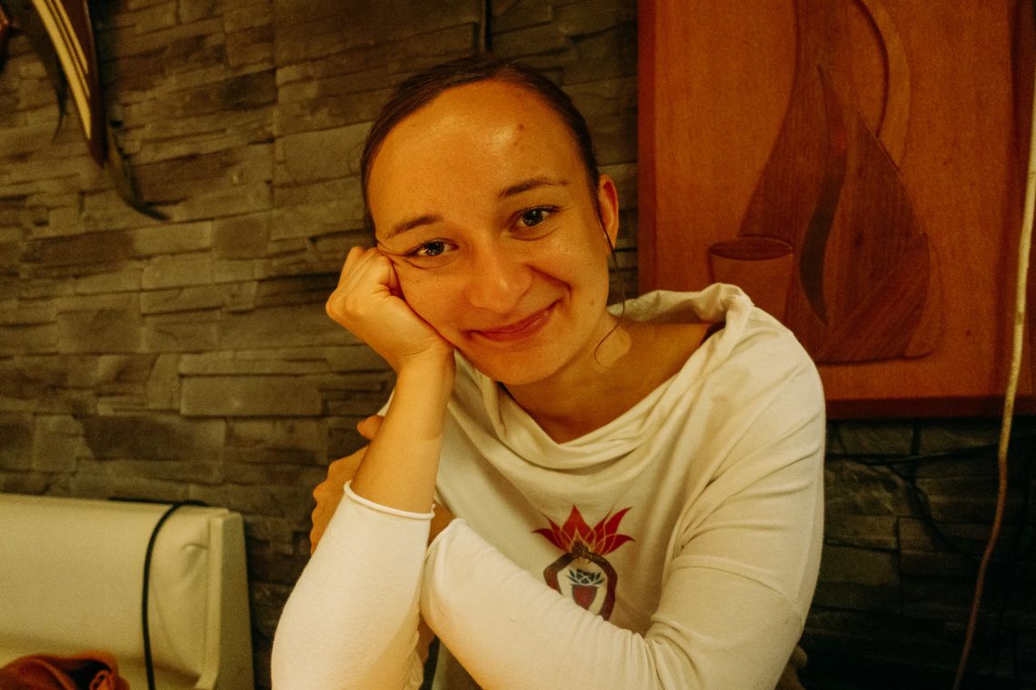 Teresa at a table of thali