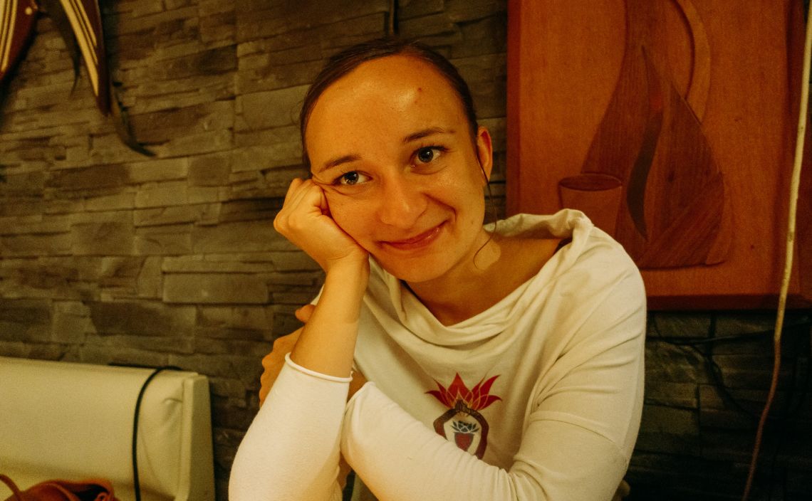 Teresa at a table of thali