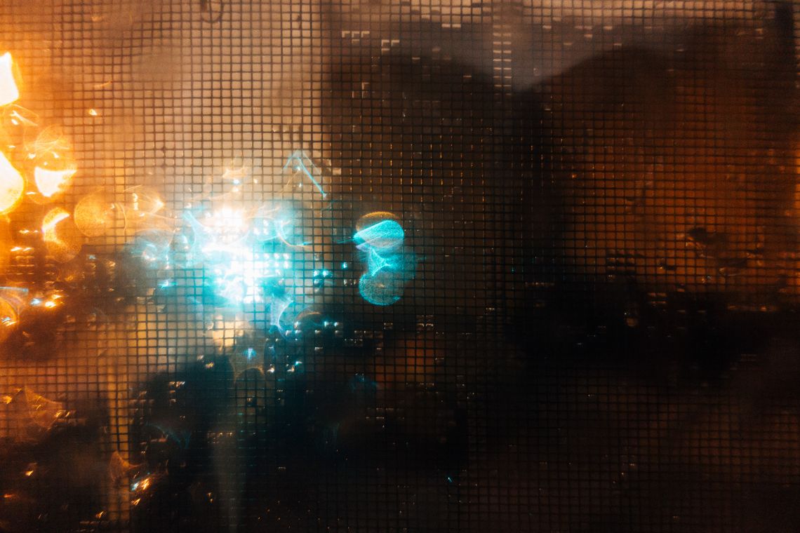 Rain on the window, focal point on the screen