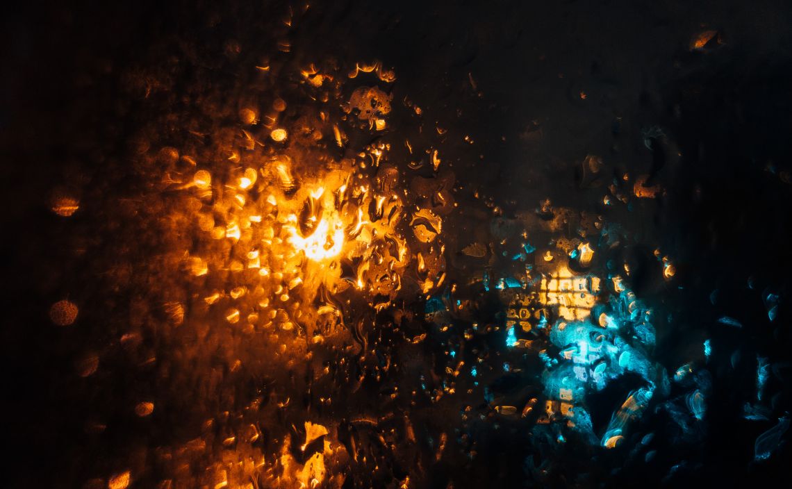 Rain on the window, focal point on the glass