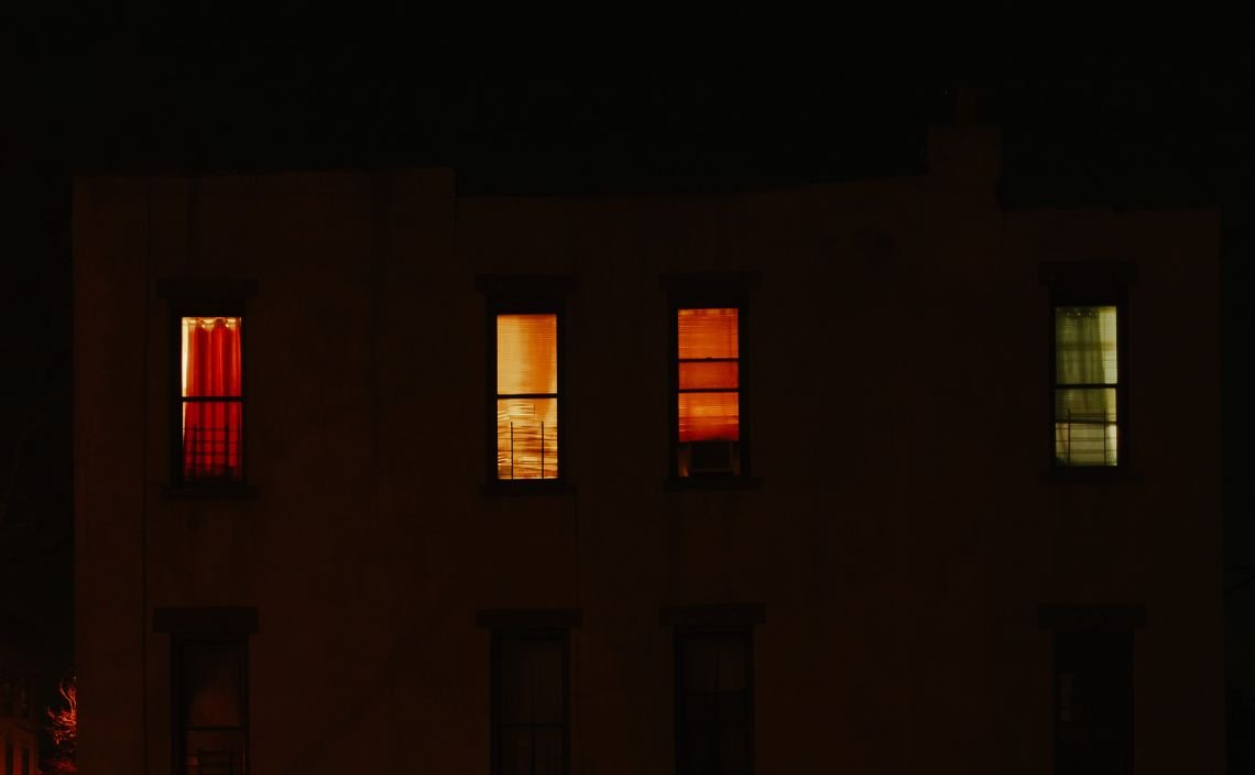 Neighbors in the night on Quincy Ave. in Bed-Stuy.