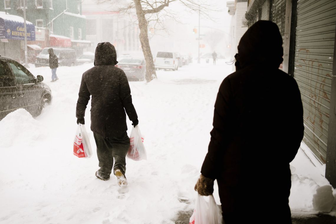 Grocery shoppers on Ralph Ave
