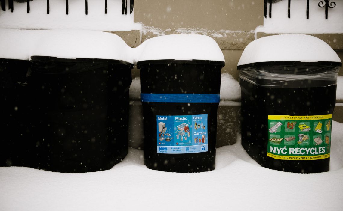 Random image of garbage cans with snowdrift, trying to show how much has accumulated