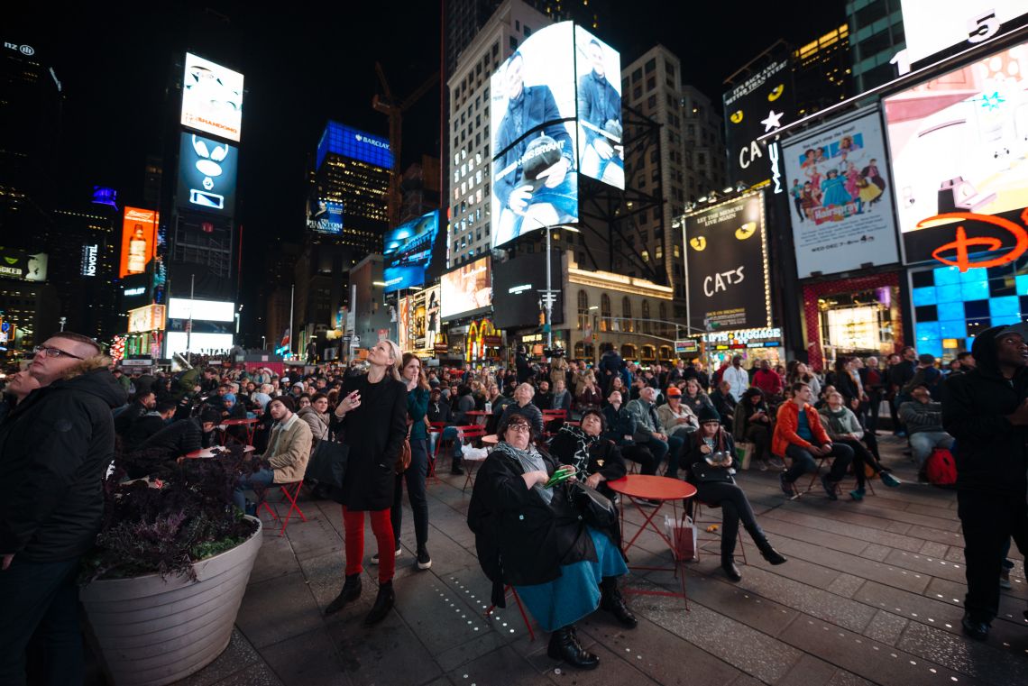 Watching the results trickle in at Times Square