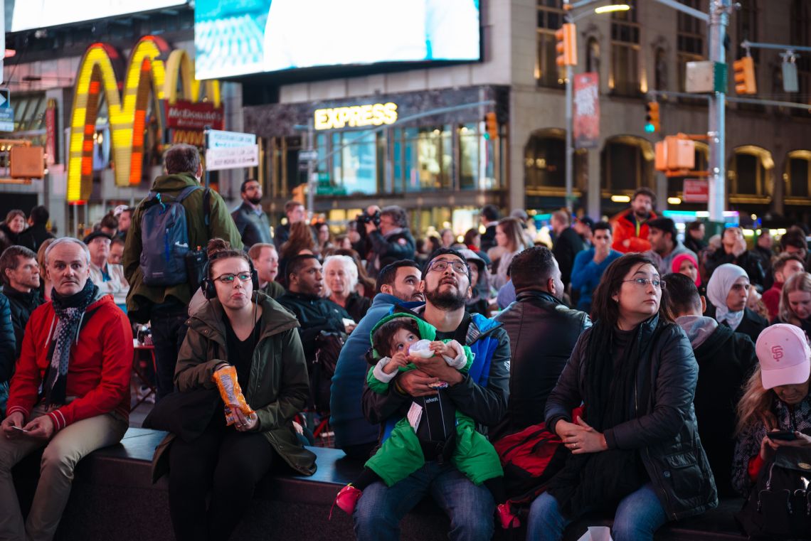 Watching the results trickle in at Times Square