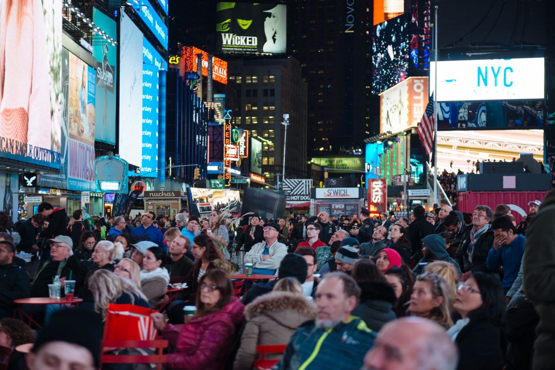 Watching the results trickle in at Times Square