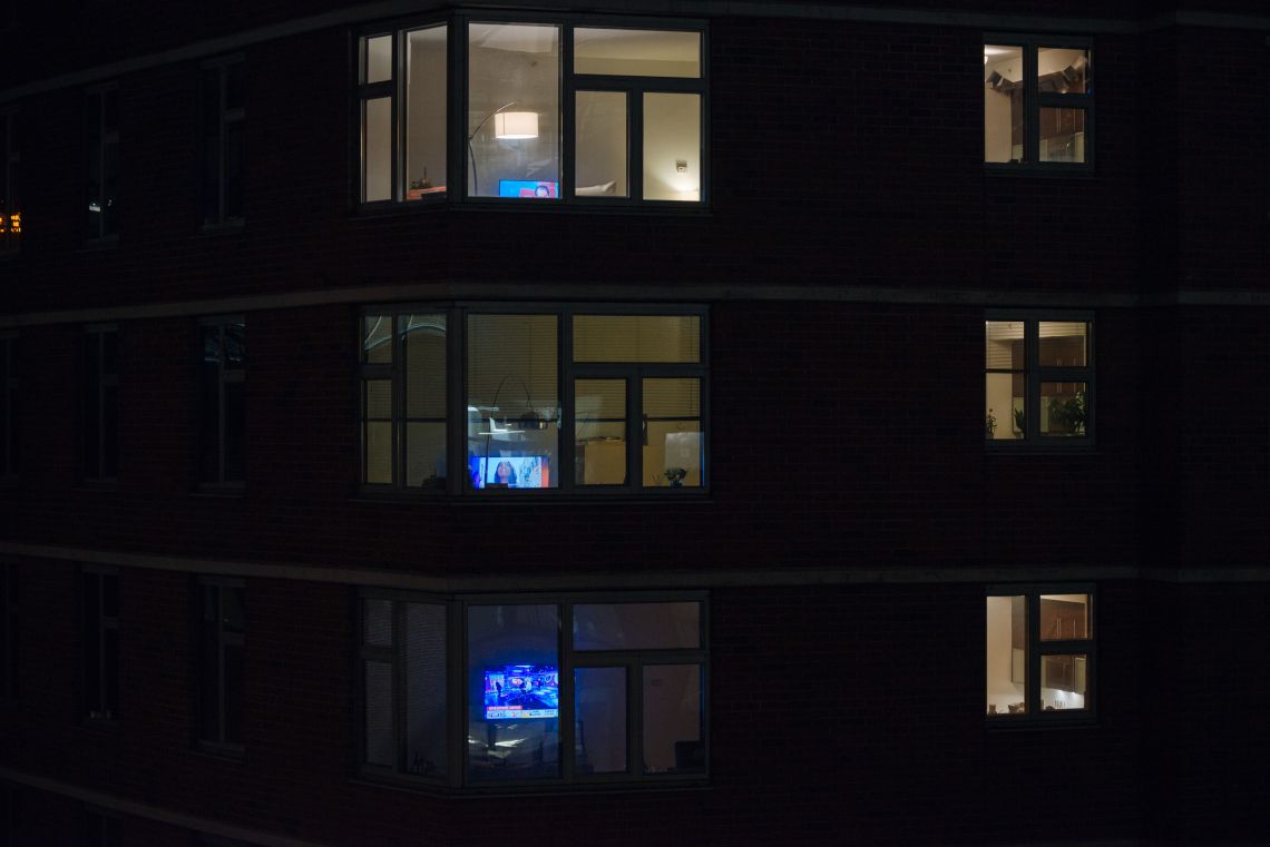 Residents in DUMBO watch election results on TV