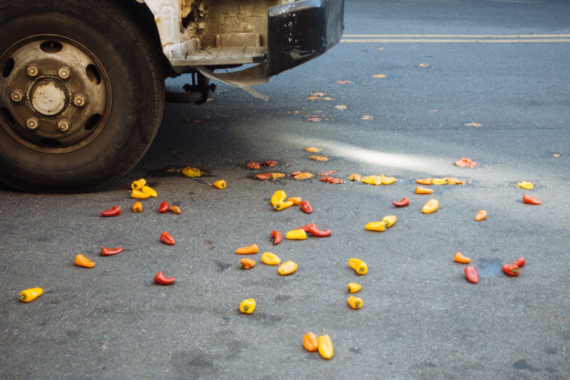 Box truck near pepper carnage.