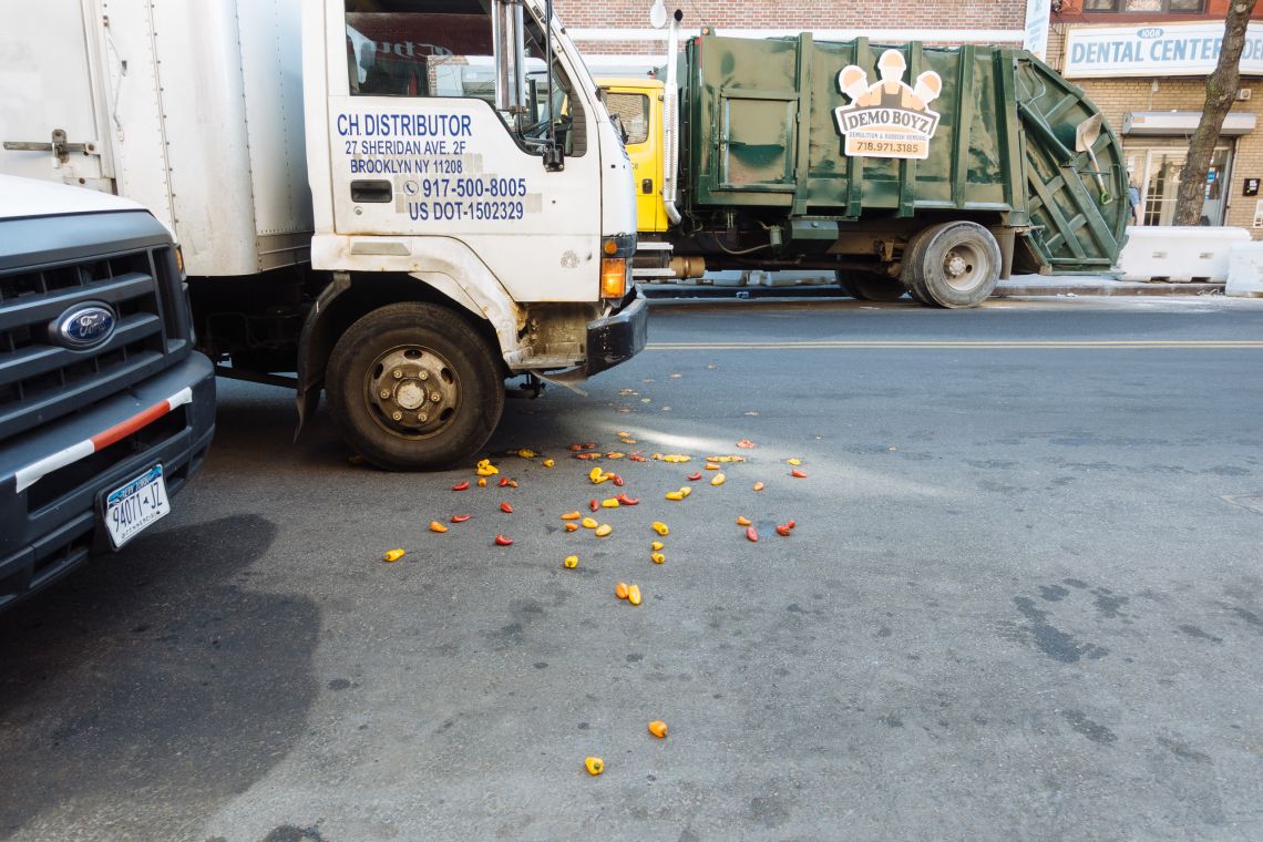 Box truck near pepper carnage