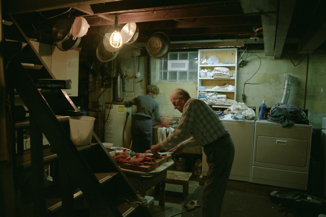 elderly couple carving deer in basement of wexford pittsburgh pennsylvania